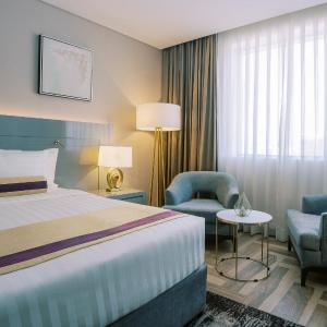 Deluxe King Room with Balcony”
