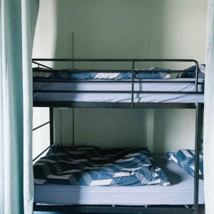 Bed in 4-Bed Female Dormitory Room with Shared Bathroom (Age 18-35 years old only)