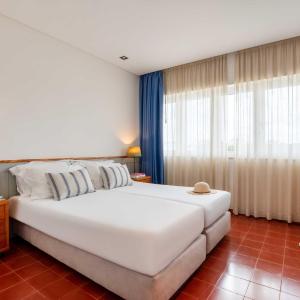 Three-Bedroom Apartment with Balcony and Pool View