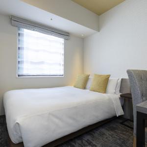 Moderate Double Room with 55 in Bed and In-room Washer-Dryer 1-2Adult