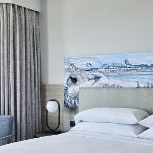 One-Bedroom King Suite with Sofa Bed and Sea View