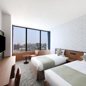 Twin Room with River View - Non-Smoking