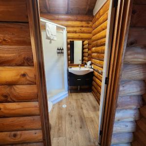 1 single bed in a 3 Bed Log Cabin Dorm (No Bunks)