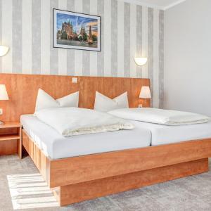 Triple Room (3 Adults or 2 Adults + 1 Child)