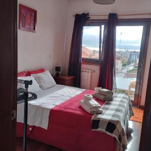 Basic Double Room with Balcony and Shared Bathroom