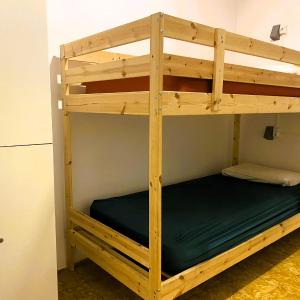 Single Bed in Dormitory Room