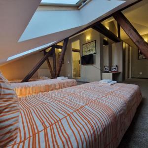 Quadruple Room with Private Bathroom