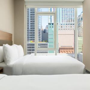 Double Room with Two Double Beds and City View 