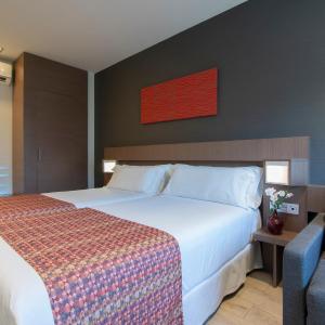 Triple Room (2 Adults + 1 Child)