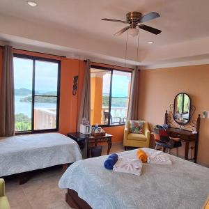 Penthouse Queen Suite with Ocean and Jungle View