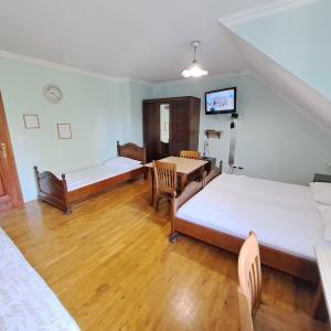 Superior Triple Room with Kitchenette