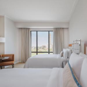 Deluxe Queen Room with Two Queen Beds and Golf View
