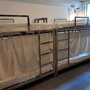 Single Bed in Dormitory Room
