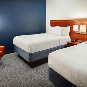 One-Bedroom Family Suite with Two Double Beds and Sofa Bed