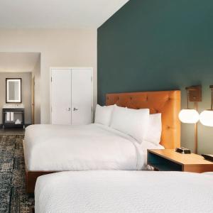 Two-Bedroom Suite with Four Queen Beds and Sofa Bed