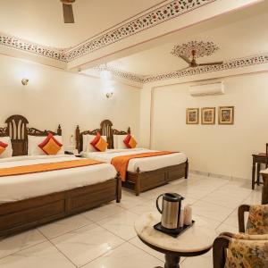 Family Suite: Enjoy use of the new rooftop swimming pool, kids stay complimentary, secure gated parking, and a dedicated travel desk to assist with local sightseeing tours, intercity travel arrangements, and exciting activities