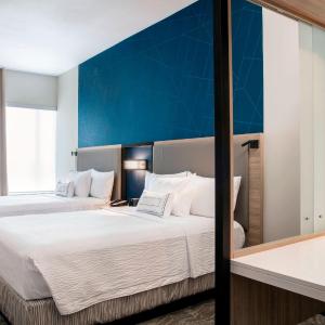 Queen Suite with Two Queen Beds and Sofa Bed