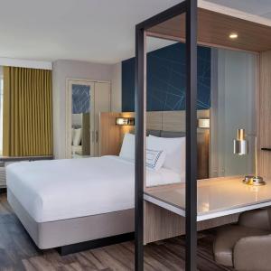 King Suite with Partial Ocean View, Trundle Sofa and Balcony