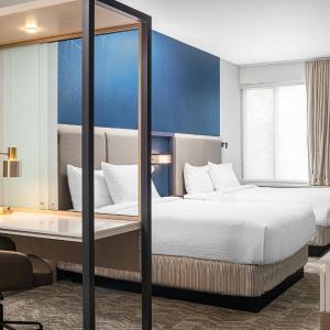 Queen Suite with Two Queen Beds, Train View and Trundle Sofa