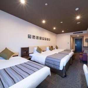 Deluxe Quadruple Room - Non-Smoking - Eco Plan - No Room Cleaning Service
