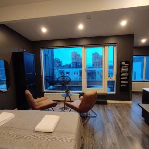 Penthouse Studio Apartment with Balcony