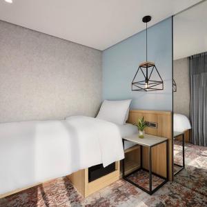 Single Bed in Mixed Six-Bed Dormitory with Shared Bathroom