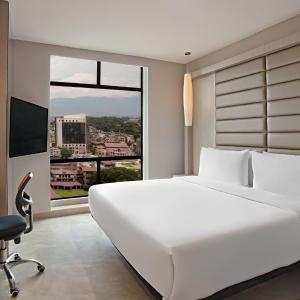Loft Breezy Suite - King Room with 15% off on Food and Soft Beverage and Free Two-Way Airport Transfer in Private Car