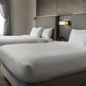 Queen Suite with Two Queen Beds, Mountain View and Trundle Sofa