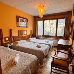 Quadruple Room (2 Adults + 2 Children)