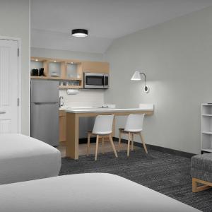 Queen Studio with Two Queen Beds and Sofa Bed