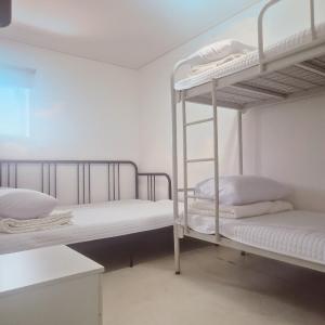 Quadruple Room with Shared Bathroom