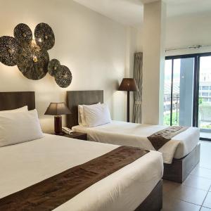 Family Deluxe Balcony Room with One-Time Complimentary Laundry (13 kg)