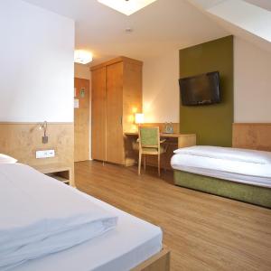 Twin Room (1 Single Bed + 1 Sofa Bed)