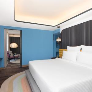 Executive Double Suite with Sofa Bed and Balcony - 2 pints of Beer & 20% off on SPA and Salon - Happy Hour Special: 50% discount on select brands (4-8 PM ) - 15% Discount on Transportation