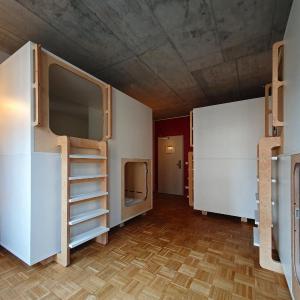 Single capsule with shared bathroom