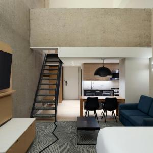 Family Penthouse with One King Bed and Two Double Beds with Sofa Bed