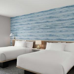 Studio Suite with Two Queen and One Sofa Bed