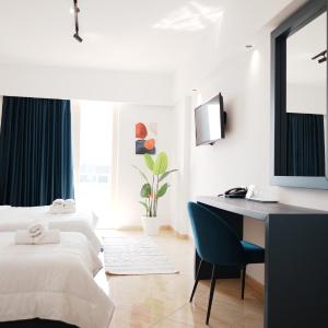 Superior Triple Room with Balcony and Sea View