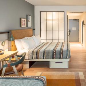Queen Room with Two Queen Beds, City View and Work Station