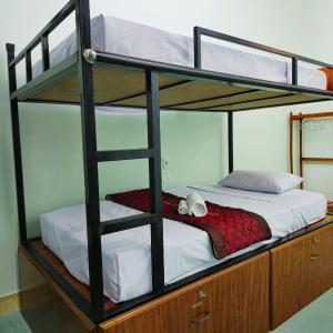 Single Bed in Dormitory Room