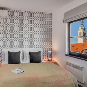Duplex Loft with roof terrace K. Capek 