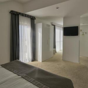 Junior Suite with Side Sea View and Balcony
