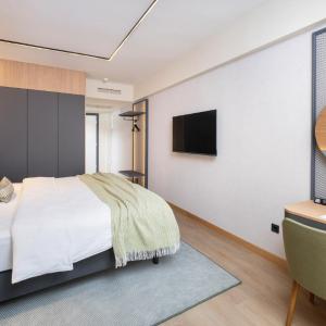 Premium Room with Balcony, Sea Side - extra bed
