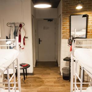 Bed in 4-Bed Female Dormitory Room with Private Bathroom