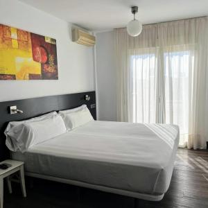 One-Bedroom Apartment double bed with balcony