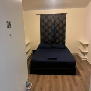 Queen Room with Shared Bathroom