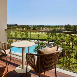 One-Bedroom King Suite with Sofa Bed and Balcony - Sea View and Club Lounge Access