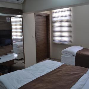 Deluxe Double Room (2 Adults + 1 Child)