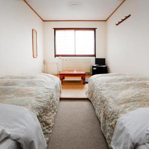 Twin Room with Shared Bathroom