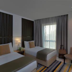 Two Bedroom Suite with kitchenette - City Skyline View